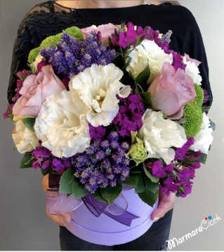 Purple Colored Flowers in The Box