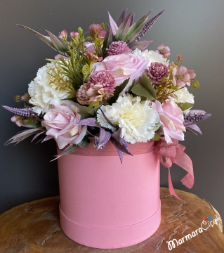 Artificial Flowers in a Pink Box