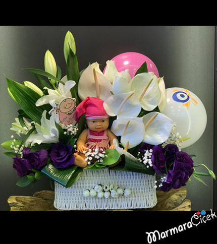 Arrangement with Baby in Basket