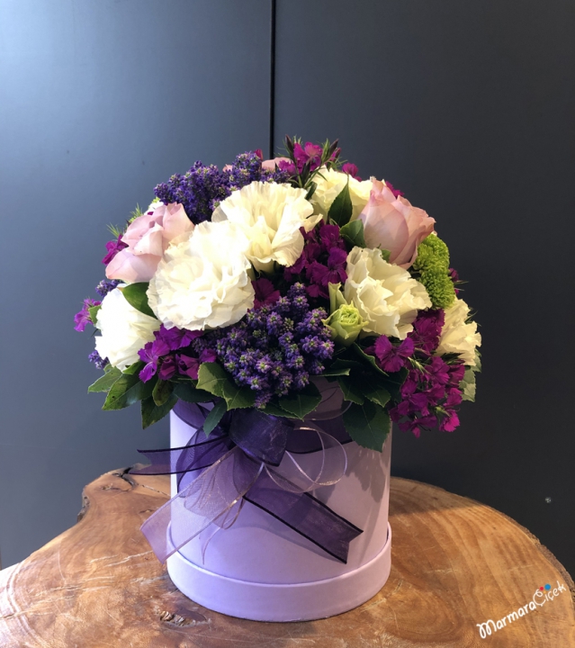 Purple Colored Flowers in The Box