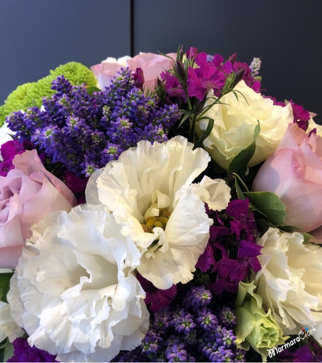 Purple Colored Flowers in The Box