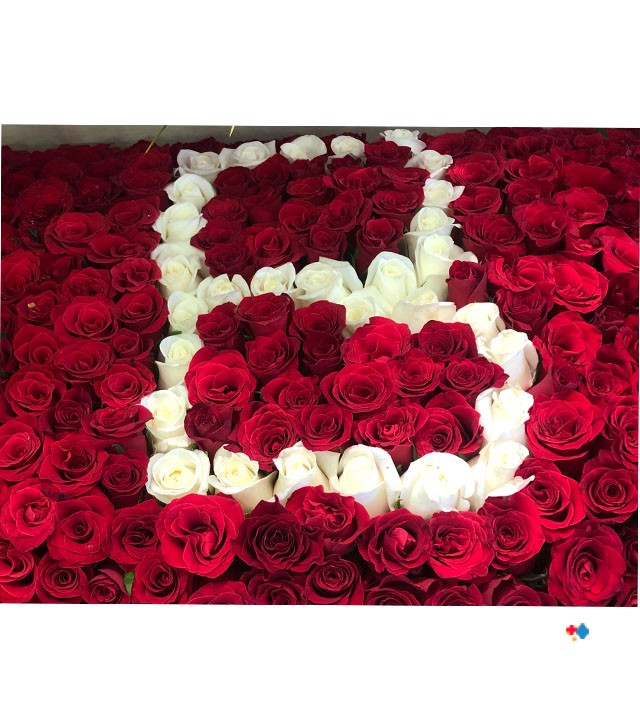 initials in The Suitcase Flower Arrangement