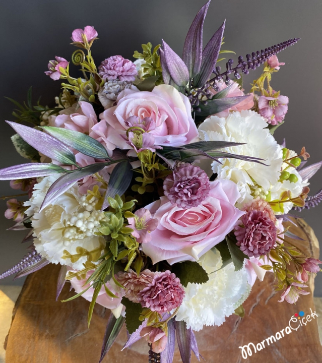 Artificial Flowers in a Pink Box